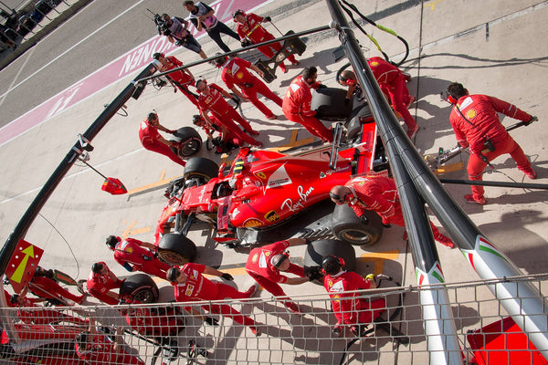 How an F1 Pit Stop Changes Four Tyres in Under Two Seconds