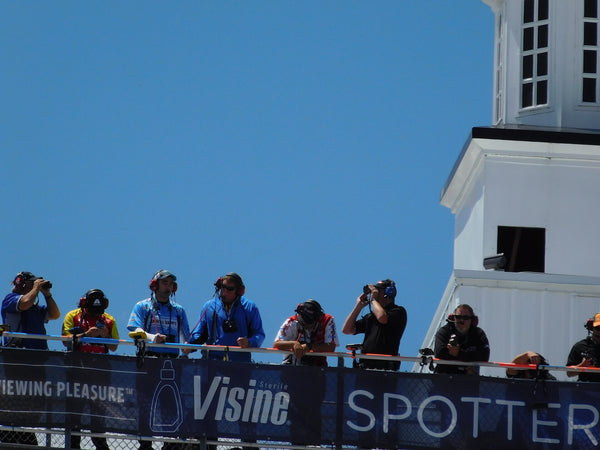 The Voice in Your Driver's Ear: How NASCAR Spotters and Team Radios Actually Work