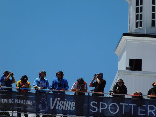 The Voice in Your Driver's Ear: How NASCAR Spotters and Team Radios Actually Work